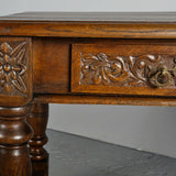 Carved turned leg antique writing table with drawer, chestnut
