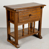 Pair of antique carved accent tables with drawer and stretcher shelf, oak and walnut