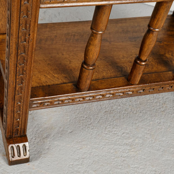 Pair of antique carved accent tables with drawer and stretcher shelf, oak and walnut