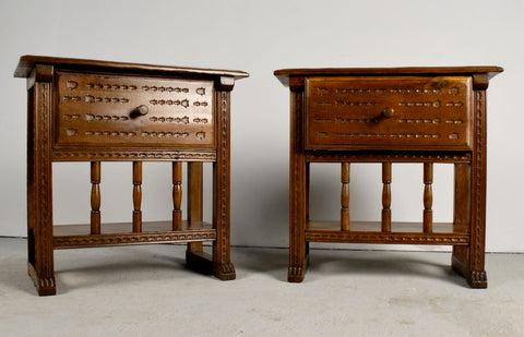 Pair of antique carved accent tables with drawer and stretcher shelf, oak and walnut