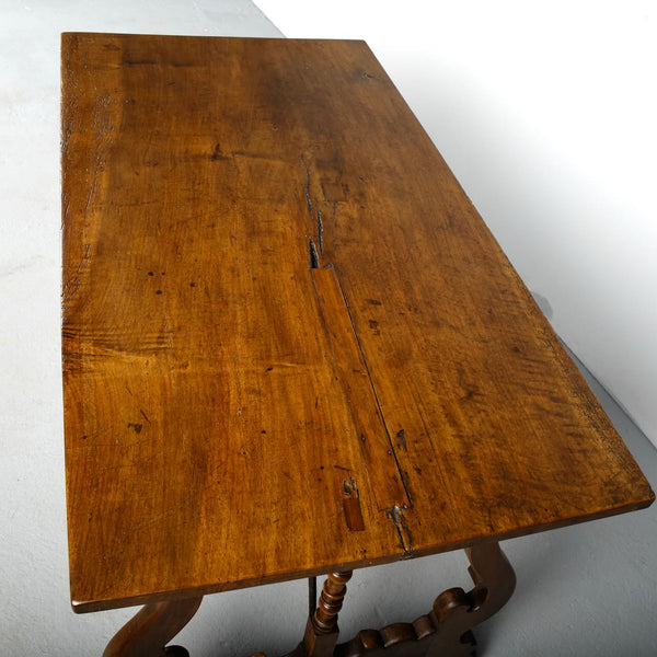 Antique lyre leg writing table with iron stretchers, walnut