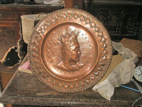 Antique embossed copper tavern plates