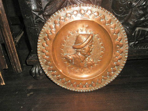 Antique embossed copper tavern plates