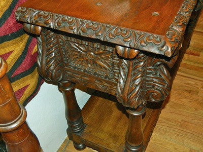 Carved four-drawer "Cusco" console table