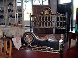 Carved king-size “Medallion” bed in black and silver