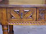 Carved two-drawer “Burgales” table