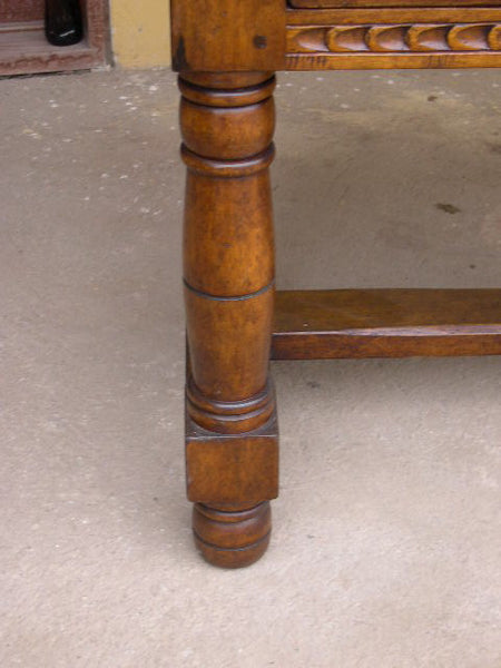 Carved two-drawer “Burgales” table