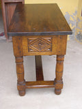 Carved two-drawer “Burgales” table