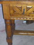 Carved four-drawer "Burgales" table