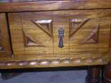 Carved four-drawer "Burgales" table