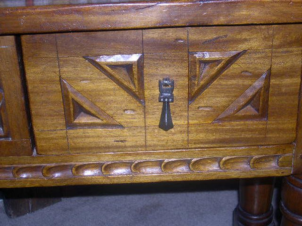 Carved four-drawer "Burgales" table