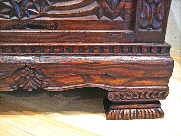 Heavily carved reproduction Basque arms chest, reclaimed pine