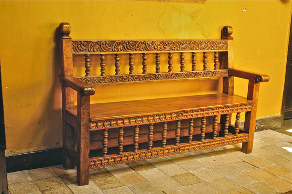 Reproduction carved Spanish colonial “Cusco” bench, cachimbo hardwood