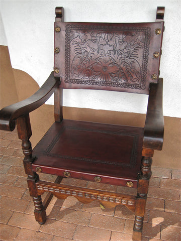 Reproduction carved and tooled leather friar's chair, cachimbo hardwood