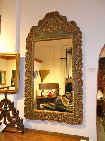 Reproduction carved, polychromed and gilt Spanish colonial mirror frame, cachimbo hardwood