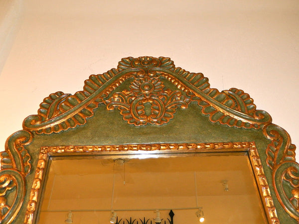 Reproduction carved, polychromed and gilt Spanish colonial mirror frame, cachimbo hardwood