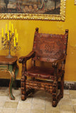 Reproduction carved and tooled leather Spanish colonial armchair, cachimbo hardwood