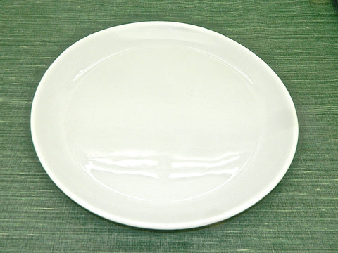 Small white refractory porcelain scalloped-edge serving platter