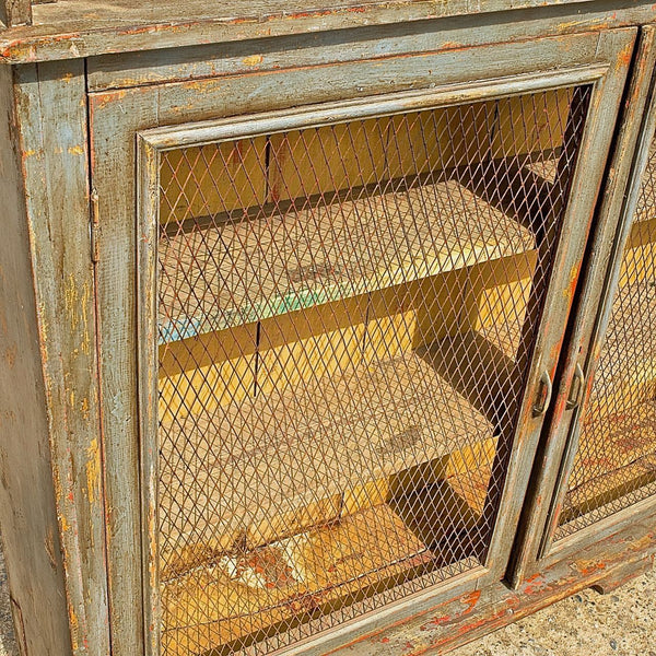 Antique four door painted pantry cabinet with chicken wire, pine