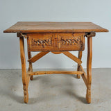 Antique carved drawer Andalusian lyre leg table with wooden stretchers, pine