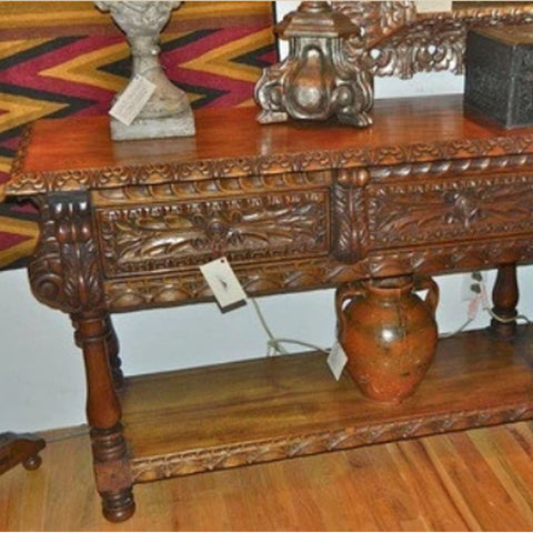 Carved two-drawer reproduction Spanish colonial console table, cachimbo hardwood