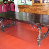 Carved reproduction lyre leg dining table with iron stretchers, reclaimed oak and chestnut